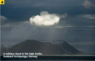  ?? ?? A solitary cloud in the high Arctic, Svalbard Archipelag­o, Norway.