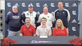  ?? Scott Herpst ?? Gordon Lee senior baseball player Jake Poindexter was joined by parents Will and Mindy Poindexter as he signed his letter of intent to play baseball at Georgia. Also on hand for the ceremony was Gordon Lee assistant coach Derek Mcdaniel, Gordon Lee head coach Mike Dunfee, Gordon Lee assistant coach Thomas Gray and Gordon Lee principal Michael Langston.
