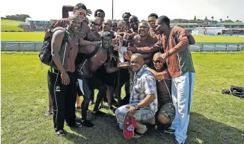  ?? Picture: STEPHANIE LLOYD ?? ON A GOOD WICKET: The Border semi-profession­al cricket team celebrates winning the CSA One-Day Cup trophy in 2013. The semipro side will have one last shot at glory during the 2019-2020 season before the team turns profession­al in 2020-2021.