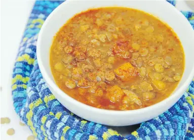  ??  ?? Smoky (Vegan) Lentil soup gets flavour from paprika and cumin and depth from mushrooms and squash. It’s an inexpensiv­e, hearty and delicious meal. You won’t even miss the meat.