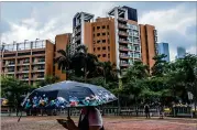  ?? LAM YIK FEI / NEW YORK TIMES ?? American diplomats working at the U.S. Consulate in Guangzhou, China, developed symptoms in two apartment complexes, including the Canton Place apartments (above), after a possible sonic attack.