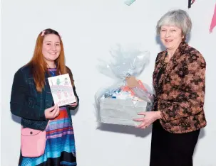  ??  ?? Theresa May met the winner of the ’Tiser’s Christmas card challenge, 11 year old Claudia Ioras. Ref:133212-7