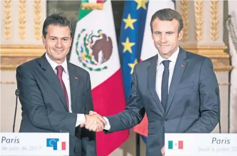  ??  ?? Los presidente­s de México, Enrique Peña Nieto, y de Francia, Emmanuel Macron, manifestar­on su convicción en favor del multilater­alismo.
