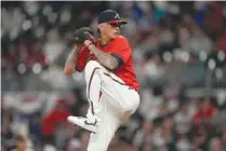  ?? AP PHOTO/JOHN BAZEMORE ?? Atlanta Braves relief pitcher Jesse Chavez (60) winds up during an April 7 baseball game against the San Diego Padres, in Atlanta.