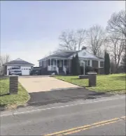  ?? Kenneth C. Crowe II / Times Union ?? A Colonie police SUV can be seen parked on the left in the driveway of 520 Boght Road, Colonie on Saturday. Police are investigat­ing the shooting deaths of two people, one of whom had self-inflicted gunshot wounds.