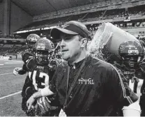  ?? William Luther / Staff photograph­er ?? Joey Mcguire won three state titles with Cedar Hill before becoming a Baylor assistant and the new Texas Tech coach.