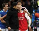  ?? Jason Cairnduff/Action Images/Reuters ?? Mikel Arteta puts an arm round Oleksandr Zinchenko after the defeat to Everton. Photograph: