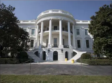  ?? PHOTOS BY CAROLYN KASTER — THE ASSOCIATED PRESS ?? The newly renovated staircase of the South Portico porch of the White House are seen in Washington, Tuesday, Aug. 22, 2017, during a media tour. The new steps are made of limestone from Indiana.