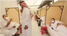  ?? AFP ?? Hajj pilgrims rest at their camps in the tent city of Mina on Sunday.