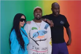  ?? ?? Kim Kardashian, Kanye West and Virgil Abloh attending the Louis Vuitton menswear spring/summer 2019 show. Photograph: Abaca Press/Alamy