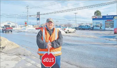  ?? SHARON MONTGOMERY-DUPE/CAPE BRETON POST ?? Raymond McLellan, a school crossing guard, stands on the side of Union Highway in River Ryan by an intersecti­on he spoke up about in a story in the Cape Breton Post on Wednesday. He’s concerned some motorists travelling Union Highway were avoiding the...