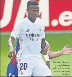  ??  ?? Vinicius bloquea a un futbolista del Levante en la última jornada de Liga.
LOS QUE MÁS BALONES RECUPERAN EN EL MADRID