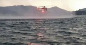  ?? FOTO AP ?? Er werd een helikopter ingezet door de hulpdienst­en.