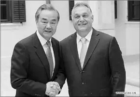  ??  ?? Hungarian Prime Minister Viktor Orban (R) meets with visiting Chinese State Councilor and Foreign Minister Wang Yi in Budapest, Hungary. (Photo: Xinhua)