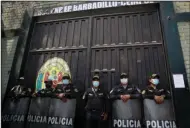  ?? ?? Police guard the jail where former Peruvian President Alberto Fujimori is being held Tuesday in Lima, Peru. (AP/Guadalupe Pardo)