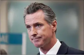  ?? ASSOCIATED PRESS FILE ?? Gov. Gavin Newsom speaks at a news conference in Oakland, Calif., in July. California could witness a stunning turnabout if voters dump Newsom and elects a Republican to fill his job in a the September recall election.