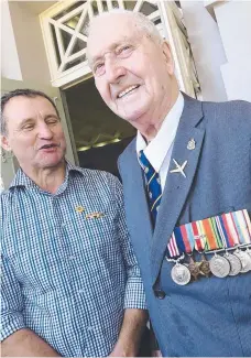  ??  ?? Ninety-seven-year-old Sgt Ernest Brough who was a member of the Rats of Tobruk at Geelong Remembranc­e Day service with friend and ex-serviceman (submarines) Roy Cook.