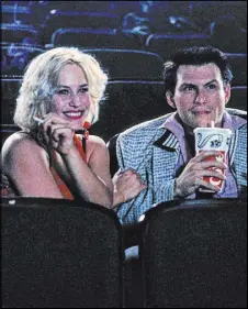  ?? Warner Bros. ?? Patricia Arquette and Christian Slater in a scene from the 1993 cult classic “True Romance.”