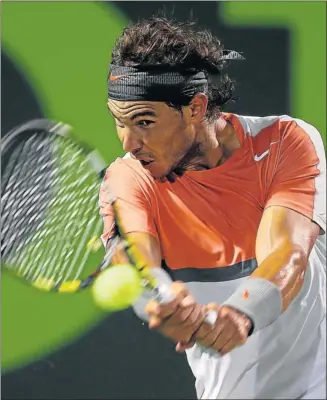  ?? Picture: GETTY IMAGES ?? TAKE THAT: Spain’s Rafael Nadal slams back a shot to Italy’s Fabio Fognini during their match on day nine of the Sony Open at Carndon Park in Florida