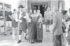  ??  ?? Costumed guides offer lessons in waltzing at Schoss Hof, a summer palace near the Austria-Slovakia border.