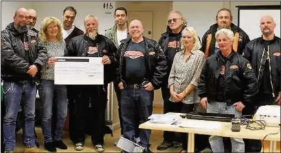  ??  ?? BIG PARTY, BIG DONATION: West London Harley Riders raised £10k for Headway with its five-day biker celebratio­n