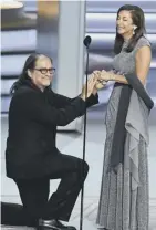  ??  ?? Clockwise from left, Henry Winkler’s 43-year wait is over, Glenn Weiss proposes to Jan Svendsen (she said yes), Claire Foy wins for The Queen and the cast of Game of Thrones