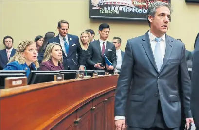  ?? PABLO MARTINEZ MONSIVAIS THE ASSOCIATED PRESS ?? Michael Cohen, U.S. President Donald Trump's former lawyer, testified before the House Oversight and Reform Committee Wednesday. Cohen was often driving the getaway car, but Trump was the one holding up the banks and paying off porn stars, Vinay Menon writes.