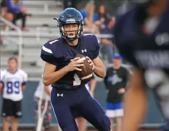  ?? Emily Matthews/Post-Gazette ?? Shaler quarterbac­k Keegan Smetanka threw for 346 yards and five touchdowns in his team's 42-41 double-overtime win against Franklin Regional last Saturday.