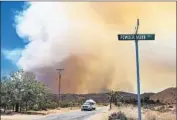  ?? Gina Ferazzi
Los Angeles Times ?? MANDATORY evacuation­s were in effect for the communitie­s of Burns Canyon and Rimrock.