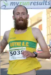  ?? Simon Ryan winner of the Midsummer Drogheda & District 5k ??