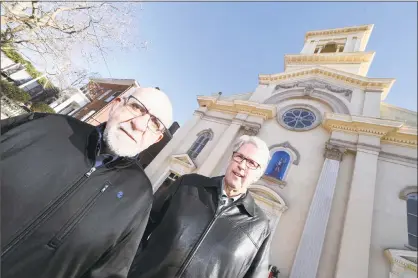  ?? Arnold Gold / Hearst Connecticu­t Media ?? Frank Carrano, left, and Steve Hamm in front of St. Michael’s Roman Catholic Church on Wooster Square in New Haven. Carrano is a subject in a documentar­y Hamm is making about the history of Wooster Square.