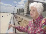  ?? FRANK ELTMAN — ASSOCIATED PRESS ?? In this July 22, 2015, photo, Lucille Horn stands on the boardwalk outside her home in Long Beach, N.Y. Horn who weighed less than two pounds at birth and wasn’t expected to survive, lived nearly a century after her parents put their faith in a...