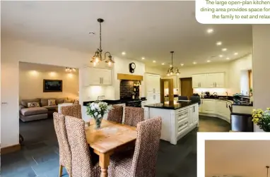  ??  ?? The large open-plan kitchen dining area provides space for the family to eat and relax