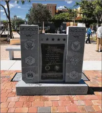  ?? CONTRIBUTE­D ?? The plaque reads: “In honor of all veterans who served in times of war and peace and in memory of those who gave their lives for our country.” The monument cost about $10,000.