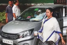  ?? PTI ?? Mamata Banerjee leaves after meeting with federal Home Minister Rajnath Singh at his residence in New Delhi yesterday. Her party has objected to the government move.