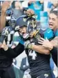  ?? Stephen B. Morton AP ?? JOSH LAMBO celebrates his winning field goal against his old team.