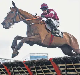  ??  ?? Star quality: Samcro soars over the final flight at Leopardsto­wn yesterday