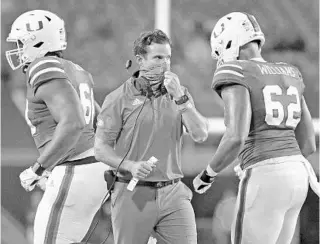  ?? AL DIAZ/AP ?? Hurricanes coach Manny Diaz is aware of how big Saturday night’s game against Louisville is for the program.