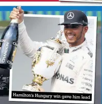  ??  ?? Hamilton’s Hungary win gave him lead