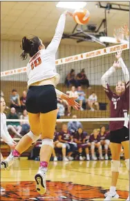  ?? Westside Eagle Observer file photo/RANDY MOLL ?? Gravette senior Balen Nelson pounds one over the net during play against Gentry in Gravette on Oct. 6.