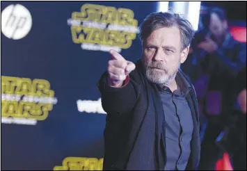  ?? PHOTO BY JORDAN STRAUSS / INVISION / AP FILE (2015) ?? Mark Hamill arrives at the world premiere of “Star Wars: The Force Awakens” Dec. 14, 2015, at the TCL Chinese Theatre in Los Angeles. Hamill, who appeared but didn’t speak in “The Force Awakens” is featured in the next “Star Wars” sequel, “The Last...