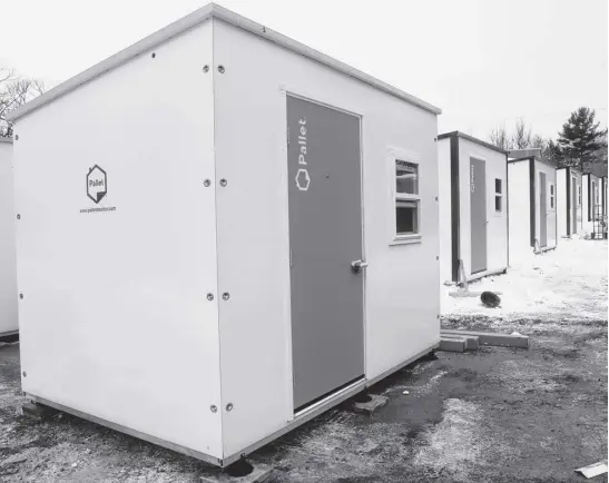  ?? TIM KROCHAK • SALTWIRE ?? Pallet shelters set up outside Beacon House in Lower Sackville on Feb. 6. Similar shelters were expected to be available in Truro last winter, but without a parcel of land to build on they went entirely unused in the community.