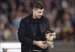  ?? ?? Spain’s mid elder Rodri with his Ballon d’Or award.