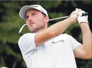  ?? Chris Seward / Associated Press ?? Russell Henley hits his tee shot on the 16th hole during the third round of the Wyndham Championsh­ip golf tournament on Saturday at Sedgefield Country Club in Greensboro, N.C.