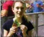  ?? SUBMITTED PHOTO ?? Rodeo Marie Hanson, 12, Fleetwood, holds her media credential in the photograph­er’s pit at the Bon Jovi concert in Allentown.