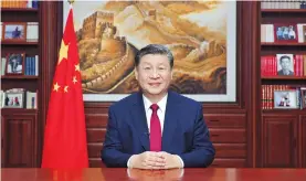  ?? ?? President Xi Jinping delivers a New Year message via China Media Group and online in Beijing yesterday to ring in 2024. — Xinhua