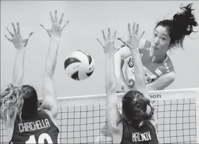  ?? AP ?? Zhu Ting of China slams a spike against Italy during the semifinal of the FIVB Volleyball Women's World Championsh­ip in Yokohama, Japan. Despite Zhu’s efforts, Italy won 25-18, 21-25, 25-16, 29-31, 17-15 to advance to Saturday’s final against Serbia.