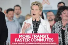  ?? ANDREW RYAN THE CANADIAN PRESS ?? Premier Kathleen Wynne talks about high-speed rail during a campaign stop at Eleven-X in Waterloo on Tuesday.