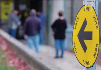  ?? The Canadian Press ?? Voters head to cast their ballot in Dartmouth, N.S. in 2019. Fewer Canadians may be going to the polls and more asking for mail-in ballots if an election is triggered this fall.