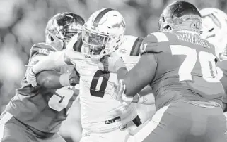  ?? JEFF SOCHKO/FAU ATHLETICS ?? Florida Atlantic defensive end Jaylen Joyner (0) is blocked by Charlotte’s D’Mitri Emmanuel during Thursday’s game at Jerry Richardson Stadium in Charlotte, North Carolina.